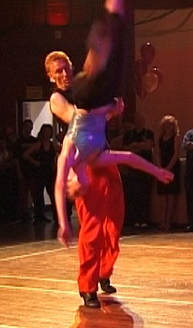 Ian Rogers with Katherine Fagence performing a Flying Catherine-Wheel at Beach Boogie